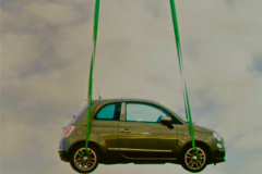 Fiat-500-by-Diesel-lifted-up-by-helicopter